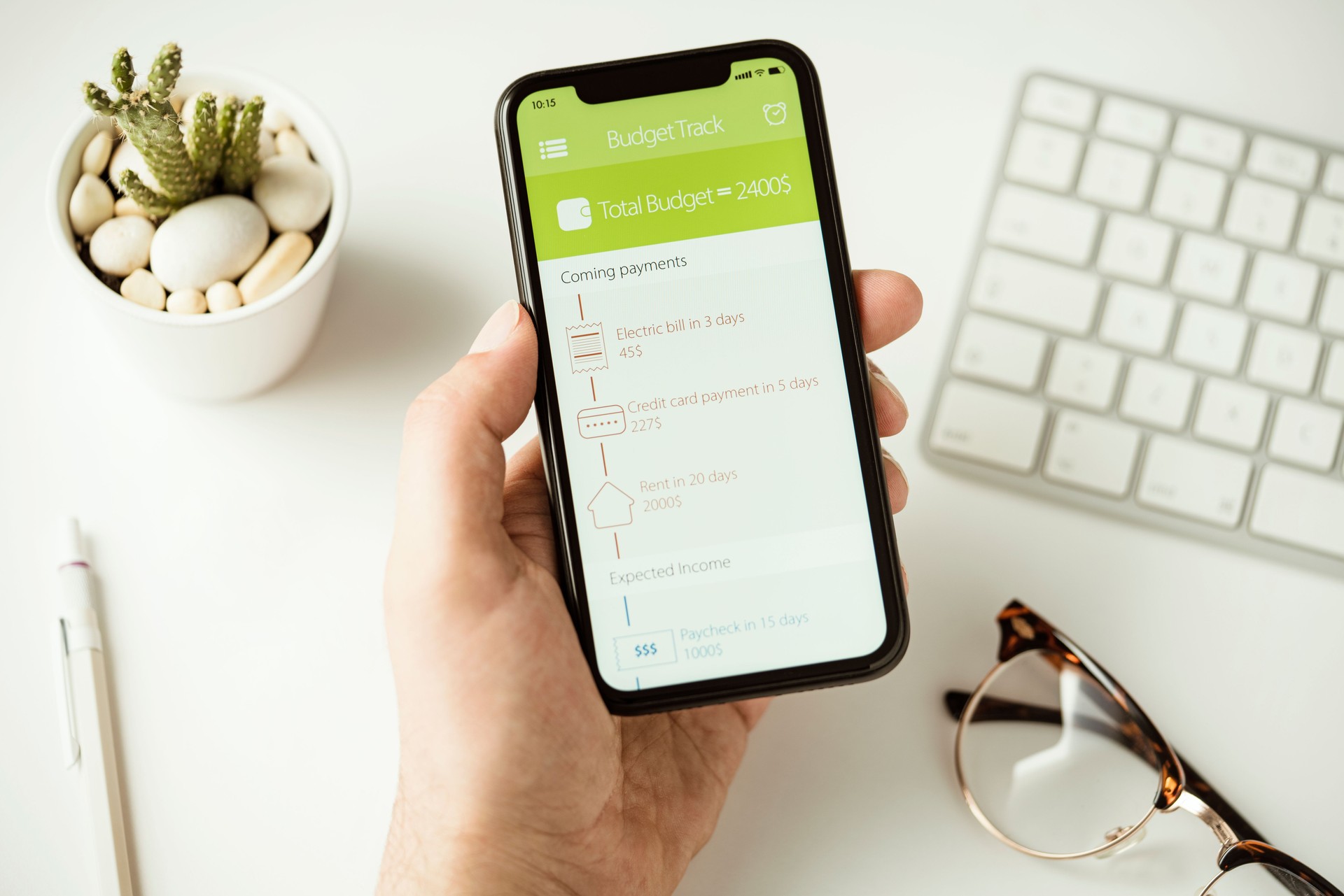 Budget tracking app on smart phone screen